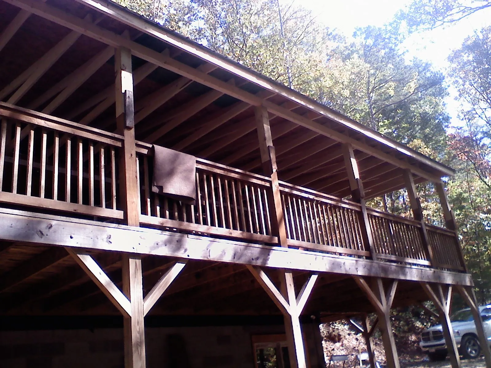Timber framing under a new elevated porch and deck — Roof Leak Repair in Klamath River by Roofing Brothers